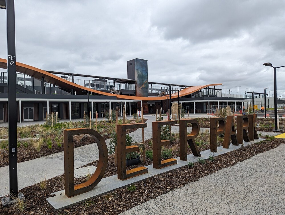 The forecourt of Deer Park station, with large DEER PARK letters